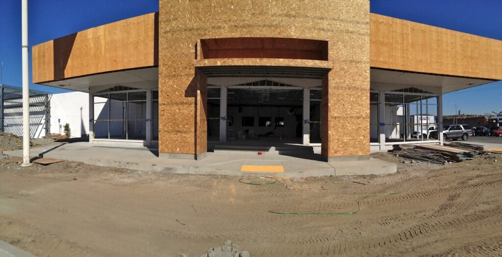 Commercial building under construction with brick and glazed frontage