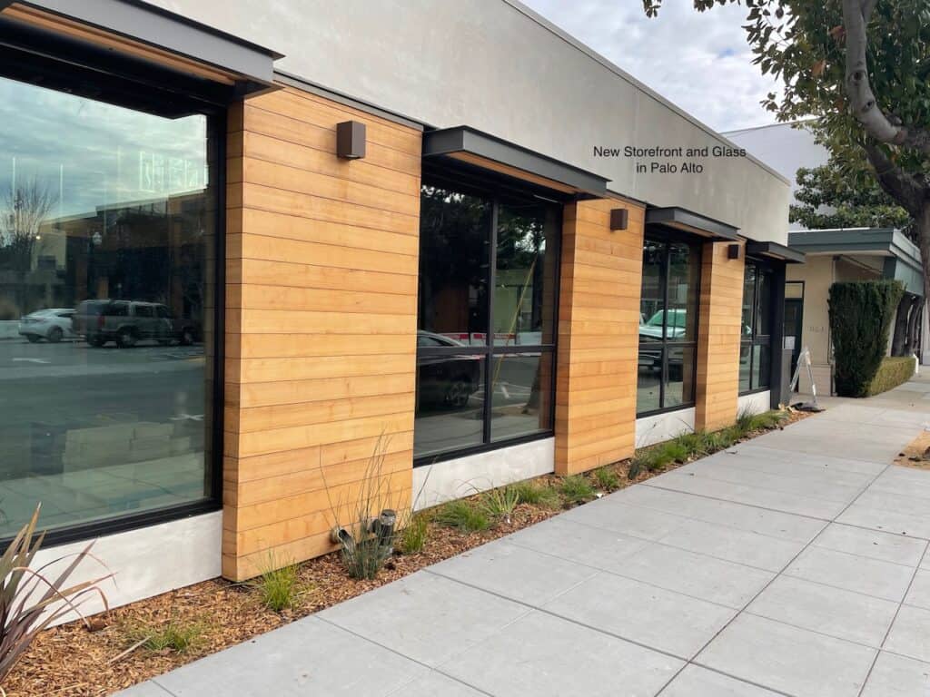 Commercial frontage with timber cladding and storefront windows