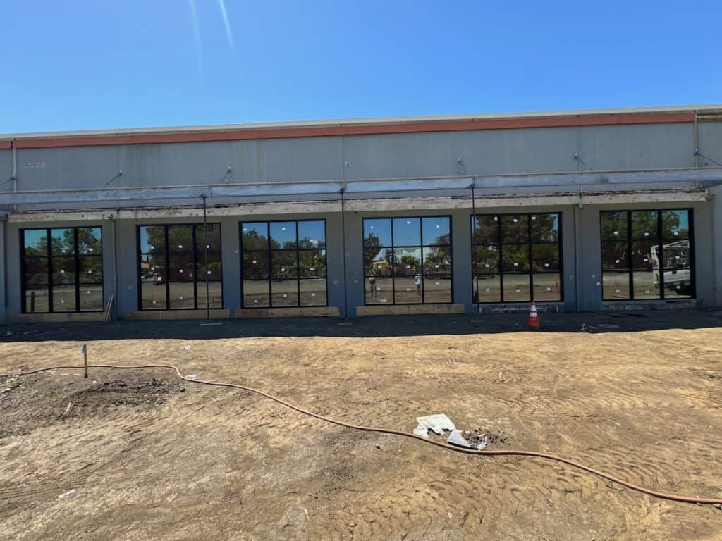 Long band of commercial windows on a building under construction