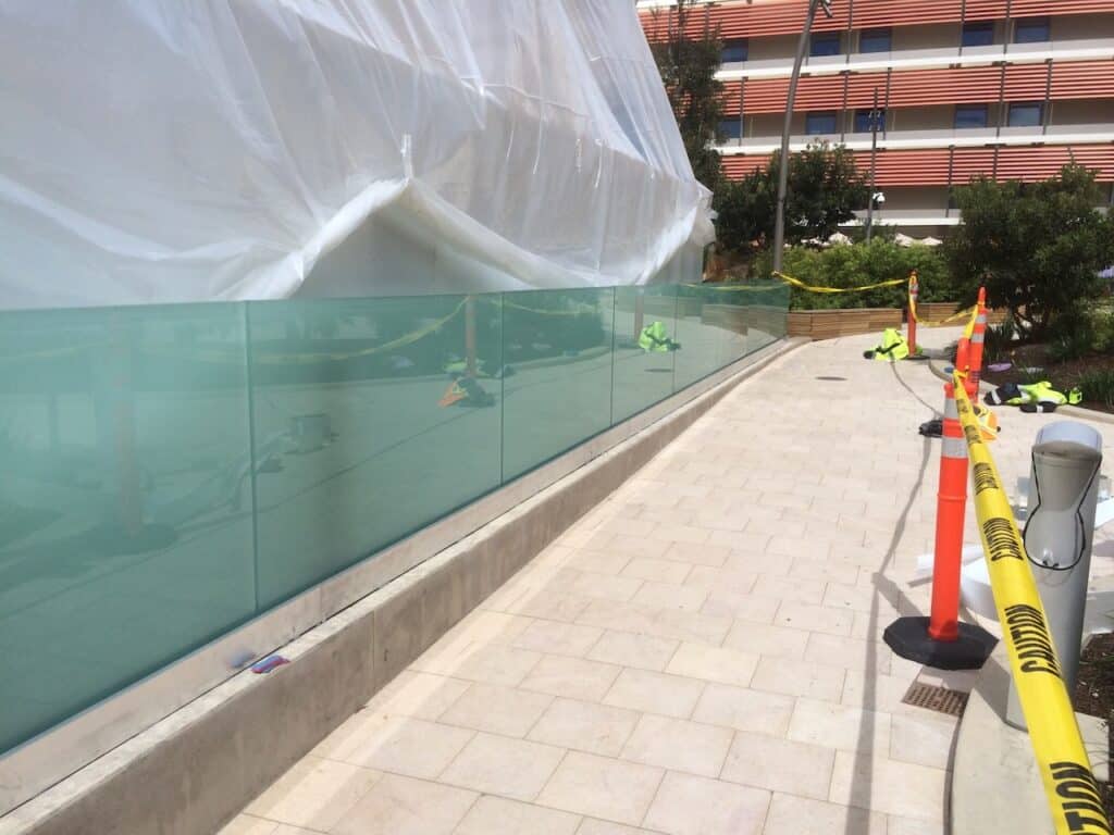 Glass panels wrapped and staged on site before installation