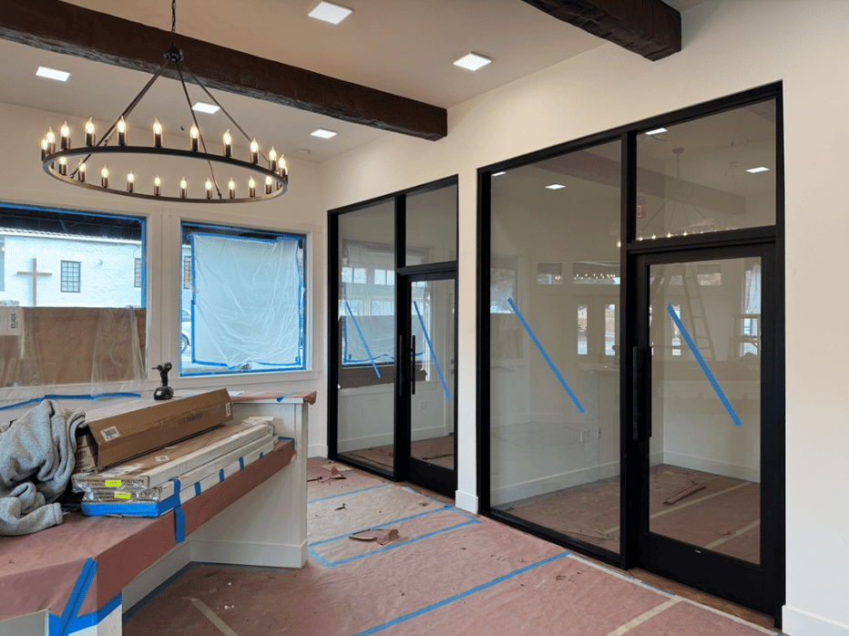 Interior with glass partitions and a feature light fitting