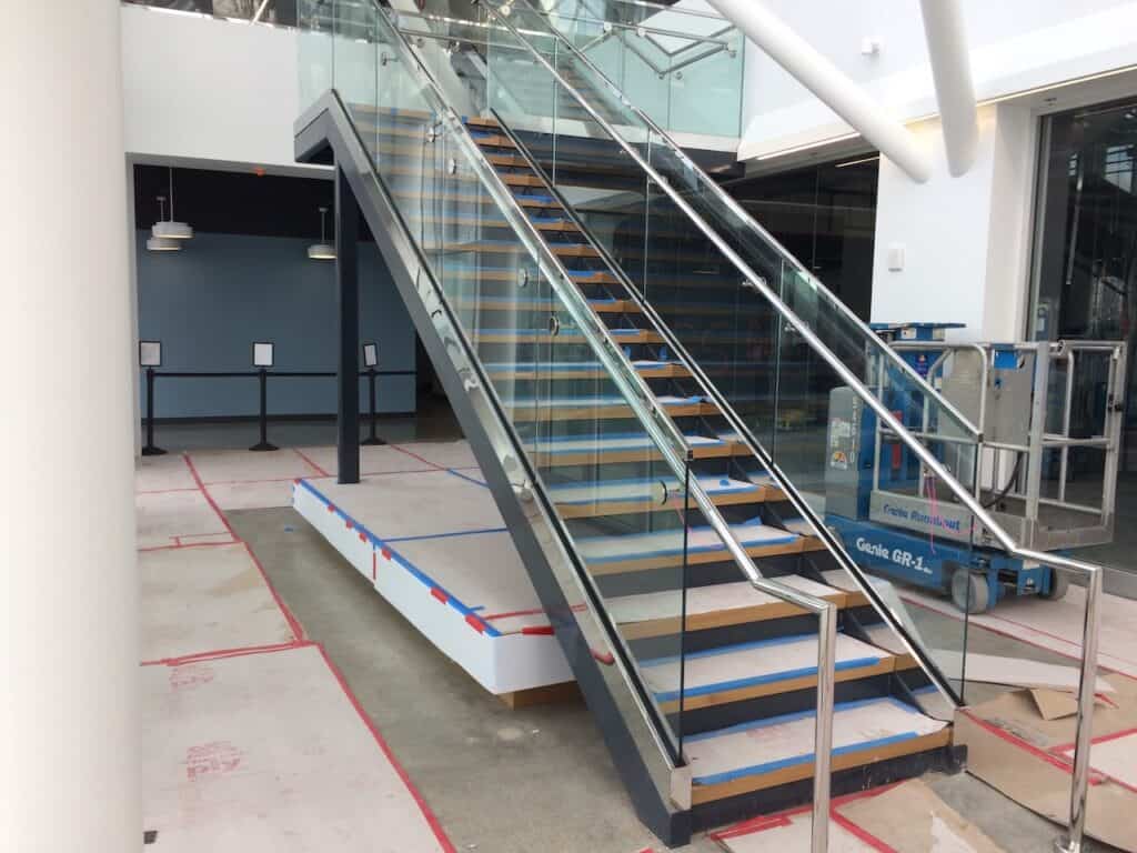 Interior staircase with a frameless glass balustrade