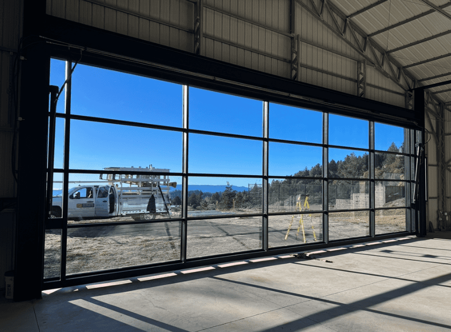 Interior view through a full width glazed folding door system