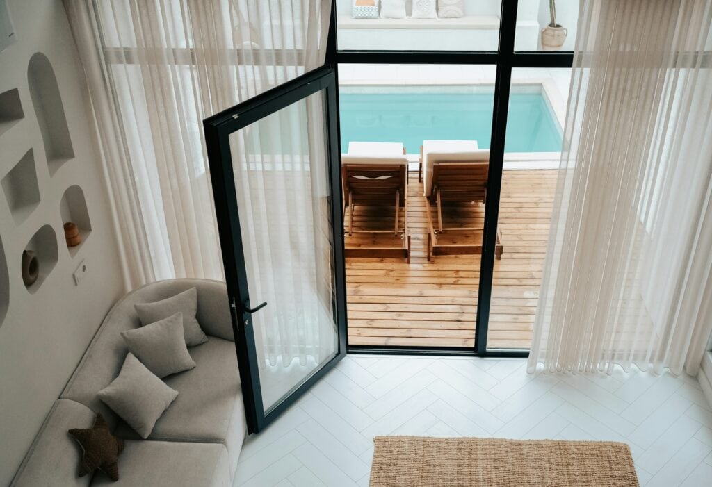 Living room with a glazed door opening onto a deck