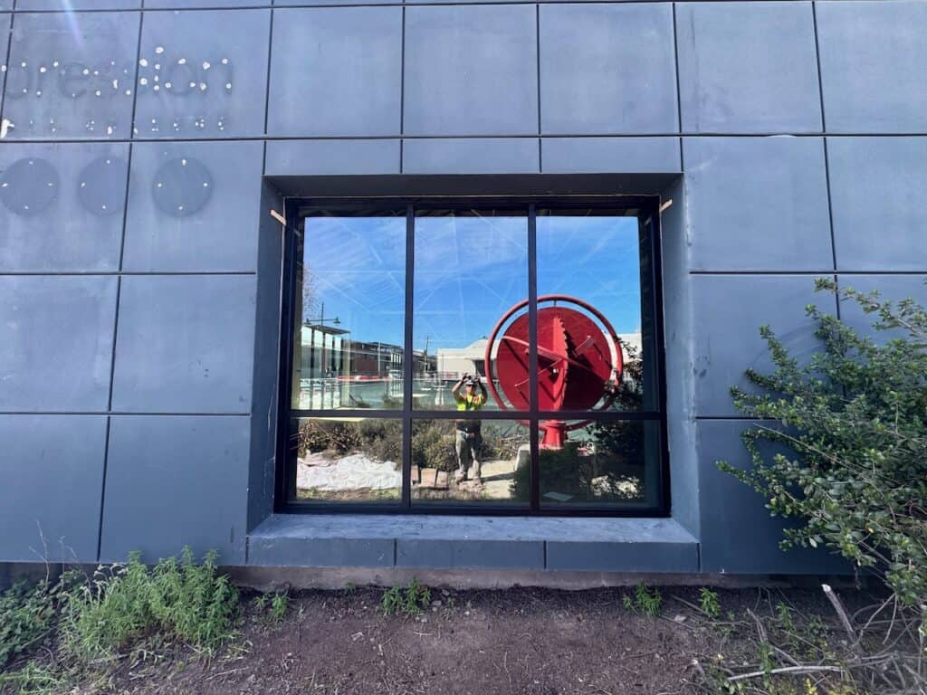 Window set into a metal clad commercial wall